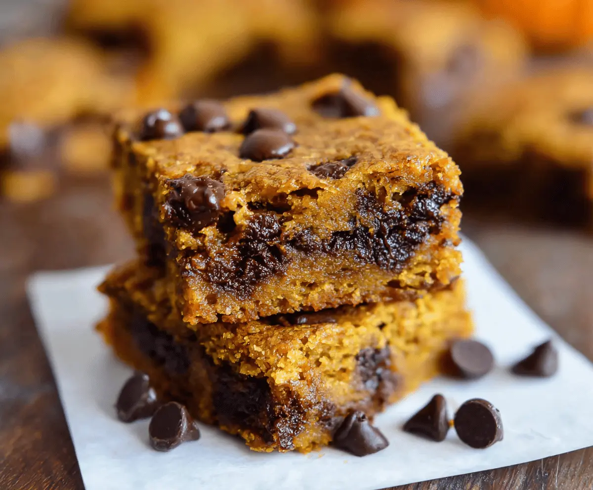 Delicious homemade pumpkin chocolate chip bars on a baking tray
