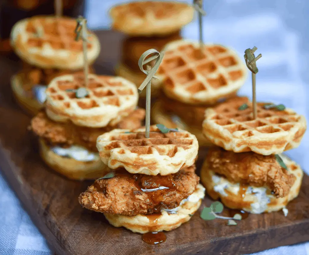 Mini Chicken and Waffle Sliders on a serving plate, perfect for brunch or party appetizers.