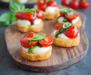 Delicious Caprese Bites with fresh mozzarella, cherry tomatoes, and basil on skewers, perfect for appetizers.
