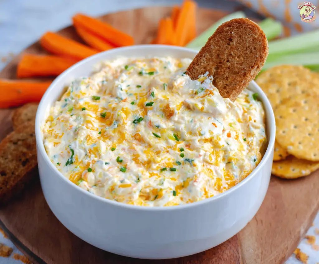 Creamy Cheddar Ranch Dip served with fresh vegetable sticks for a delicious snack