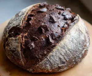 Delicious double chocolate sourdough bread with rich, gooey chocolate chunks and a golden crust.