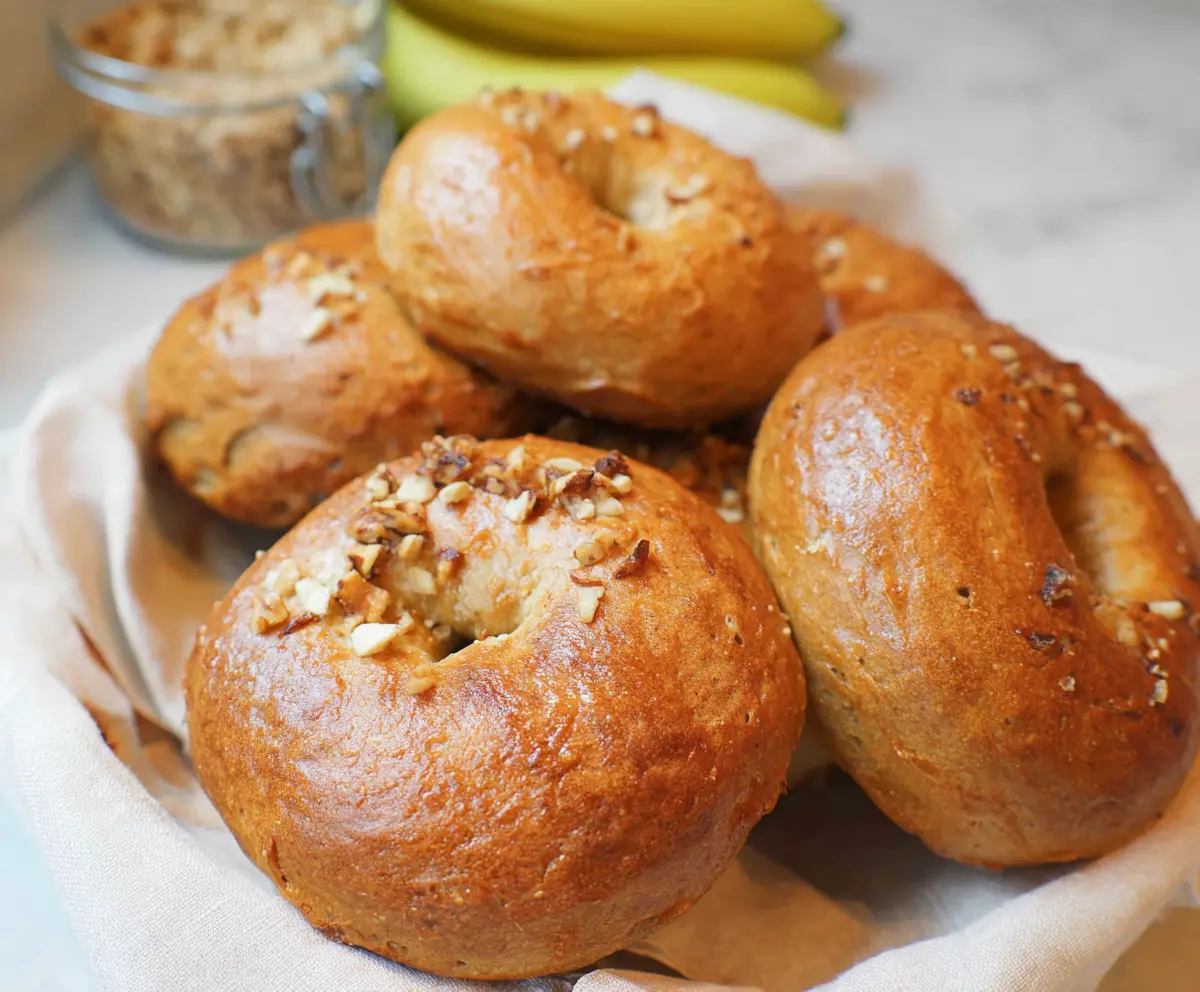 Delicious homemade banana nut bagels freshly baked with ripe bananas and crunchy walnuts.