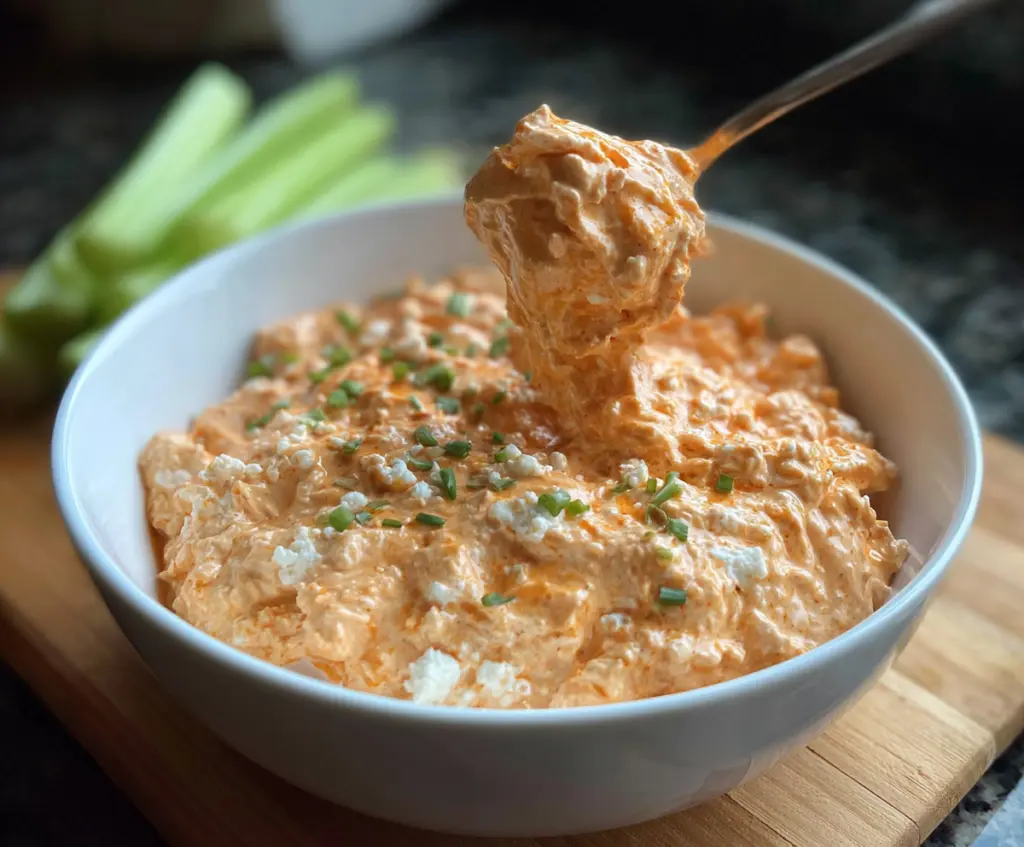 Buffalo Chicken Cottage Cheese dish featuring spicy marinated chicken and creamy cottage cheese.