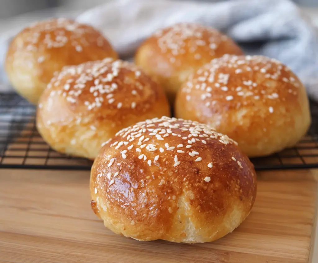 Delicious homemade cottage cheese buns on a rustic wooden table