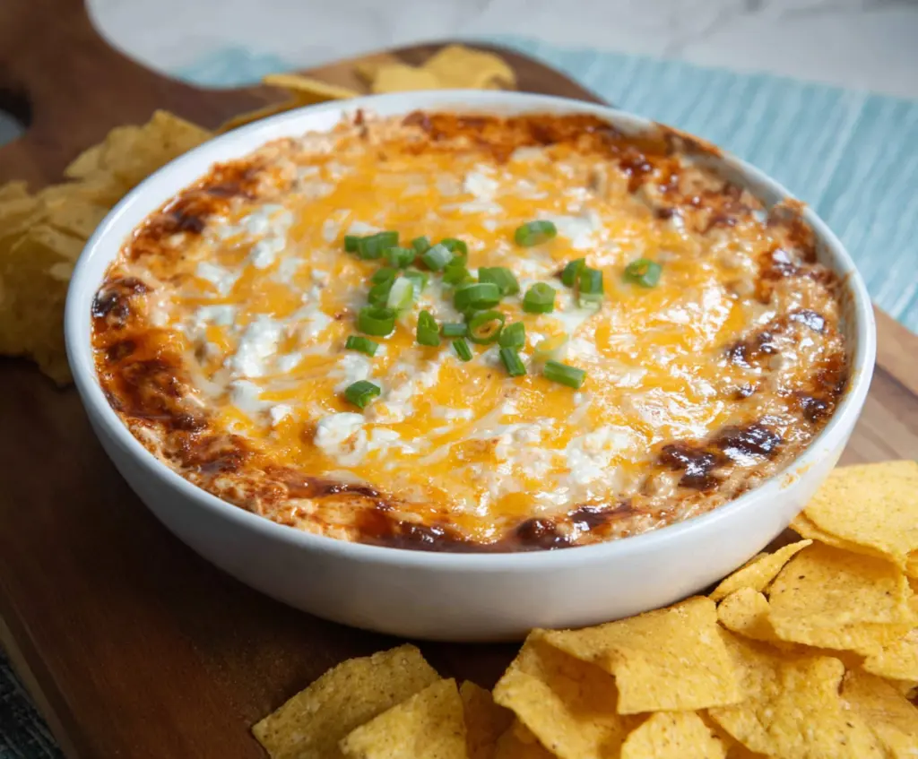 Cream Cheese Chili Dip served in a bowl with fresh ingredients for a flavorful appetizer